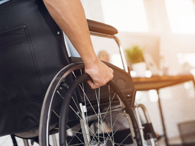 Blog_11_Persons_hand_on_wheelchair_wheel.png Blog_11_Persons_hand_on_wheelchair_wheel.png